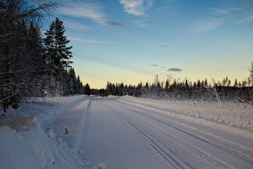 Obraz premium Winter road in Vasterbotten in northern Sweden