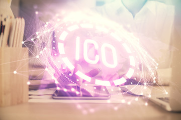 Double exposure of blockchain business sketch hologram and woman holding and using a mobile device.