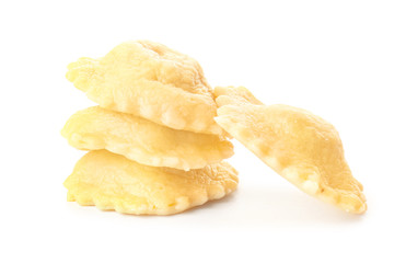 Cooked ravioli on white background