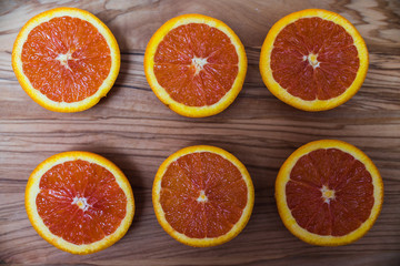 Close up of oranges on wooden background