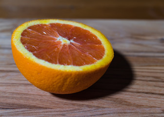 Close Up of Fresh Oranges on wooden background