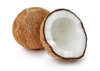 Full coconut and cracked half isolated on white background