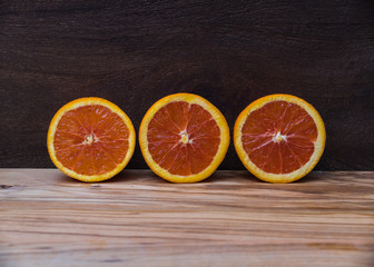 Close Up of Fresh Oranges on wooden background