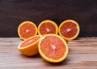 Close Up of Fresh Oranges on wooden background
