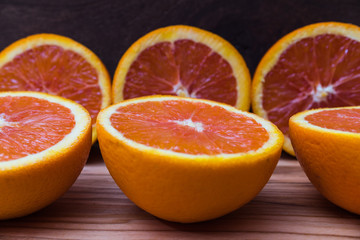 Close Up of Fresh Oranges on wooden background