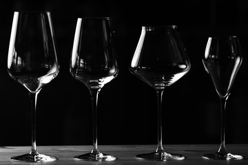 wine glasses on black background