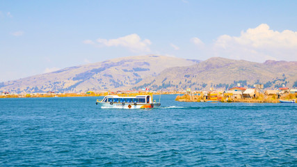 Peru Titicaca lake tourist boat sailing