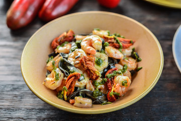 black ink pasta and grilled shrimps