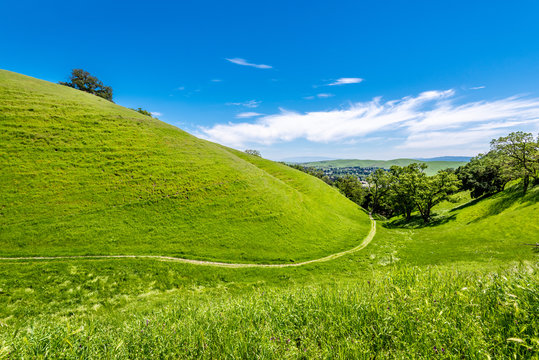 Hiking and walking trail on the slope of a hill in Sycamore Valley Preserve Contra Costa County Danville, California overlooking Camino Tassajara.