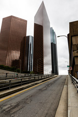 downtown los angeles city skyline without traffic during coronavirus pandemic emergency