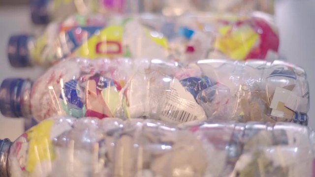 Ecobricks Made From PET Bottles Packed Solid With Used Plastics - Closeup Shot
