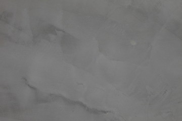 Dark grey cement wall with rustic natural texture for abstract background and design purpose