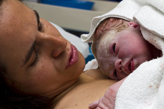 Mother with newborn baby in hospital