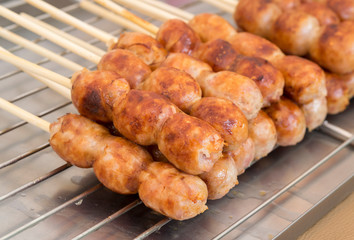 Grilled northeastern spicy sausage of Thailand. Local food made from pork and rice. Native and street food.