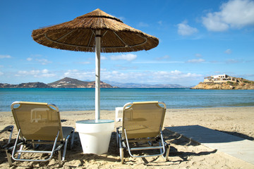 Sunbathing chairs on a beach in Greece