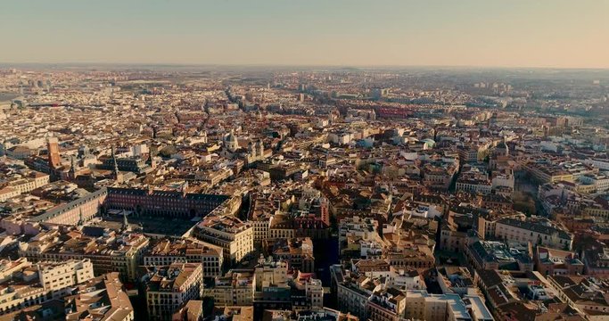 Aerial 4K footage of the famous Plaza Mayor is major public square in Madrid,Spain.Central Plaza Mayor in Madrid.Spain capital landmarks and the center Gran Via street and districts.