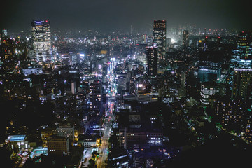 Panoramic view of Tokyo skyline, traffic and light by night from Tokyo Tower Observation Deck, Japan