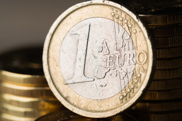 one euro coin and gold money