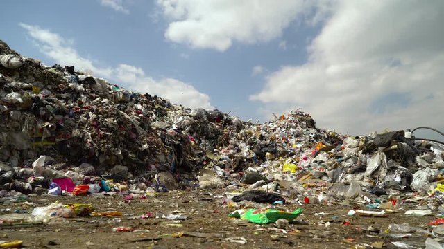 heaps of mixed garbage. city dump. 4K
