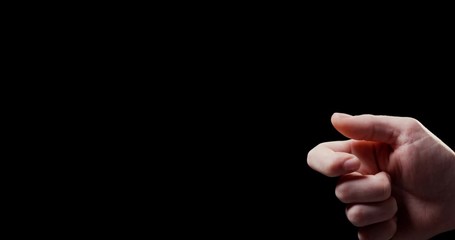 Close up of male hand flipping white poker chip with black background shot in 4k super slow motion - Powered by Adobe