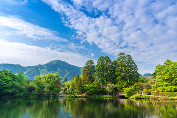 Lake Kinrin with mountain Yufu and blue sky background at Yufuin, Oita, Kyushu, Japan