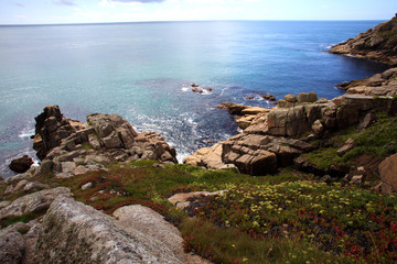 Porthcurno (England), UK - August 16, 2015: Porthcurno coastline and cliffs, Cornwall, England, United Kingdom.
