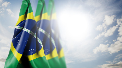 Close up waving flag of Brazil. National Brazil flag in the sky.