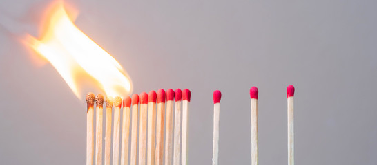 matchsticks burning and gap distance showing preventative containing coronavirus pandemic with copy space for text. Stay at home, Quarantines and Social Distancing concept