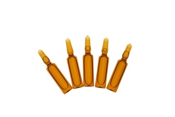 Medical ampoules.Glass brown ampoules set isolated on a white background. Medicine, health and beauty 