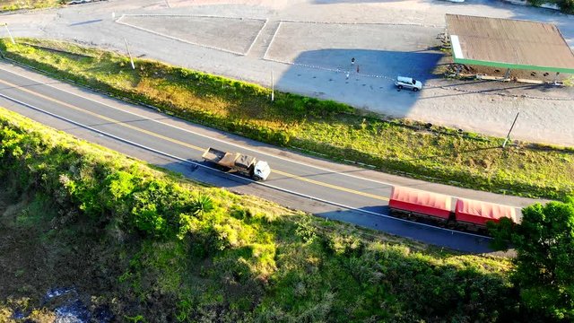 Aerial view from lorry joining the road in a Rural landscape at Chapada Diamantina, near Pai Inacio Hill. Bahia, Brazil. 