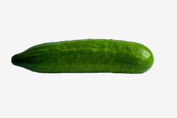 Fresh green cucumber on a white background look on the side isolate