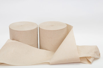 Unwound paper roll. Two rolls of paper. Simple toilet paper on a white background. A skein of paper for the toilet