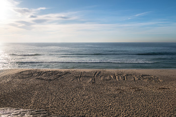 Stay Home sign drawn into the  sand at the closed Bronte Beach,Closed Tamarama Beach, Sydney...
