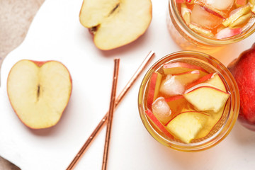 Glasses of tasty cold ice tea on table