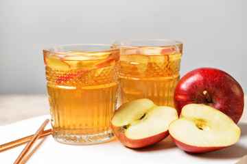 Glasses of tasty cold ice tea on table