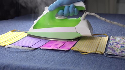 Cloth face masks for protection
against COVID-19. Disinfection and sterilisation of fabric reusable protective masks with a hot steam iron