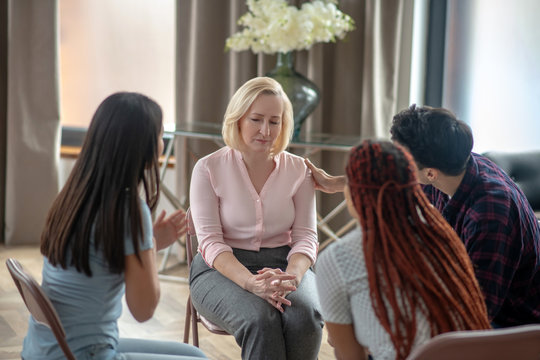 Blonde Woman Telling Her Story And Looking Upset