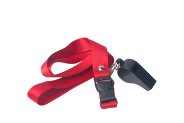 black whistle on a red ribbon, on a white background, close- up