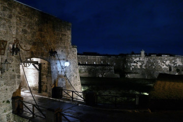 Chained bridge and majestic Morro castle from the side