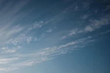 Pale sky with light clouds in the old style. Color.