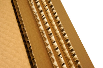 Sheets of brown corrugated cardboard used for filling in fragile parcels.