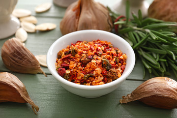 Bowl with spices on table