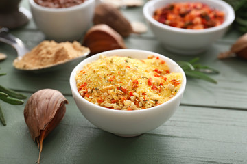 Bowl with spices on table