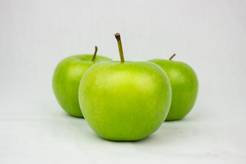Green apples with white background
