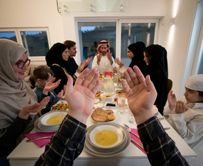 POV praying during Ramadan Iftar group meal