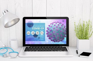 medical desktop computer with covid-19 on screen