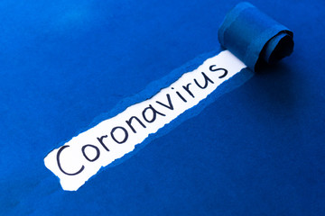 Coronavirus Covid-19 torn paper concept