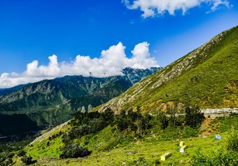 Fototapeta na wymiar An eye catching view of lush green mountains at Ramban Kashmir,India.