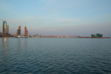 Fototapeta premium Baku, Azerbaijan - 19.01.2018: Baku boulevard at the Caspian Sea embankment. Baku is the capital and largest city of Azerbaijan. Photo of Baku city boulevard, bay and coastline view