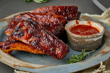 Keto food, barbecue pork ribs. Slow cooking recipe.